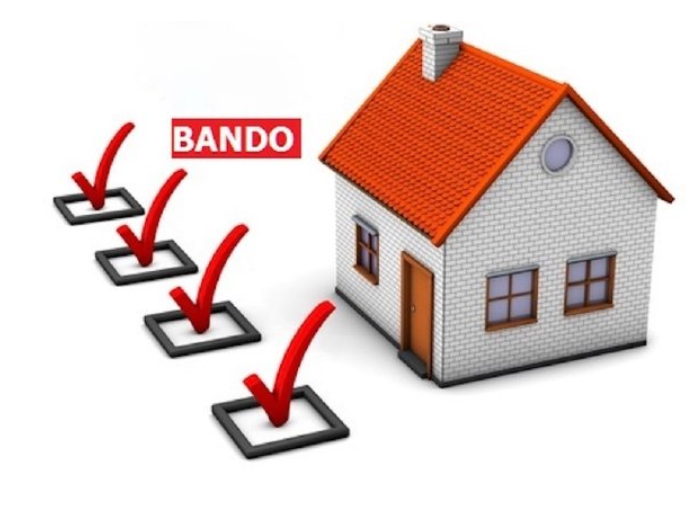 Immagine di una casa con la scritta BANDO